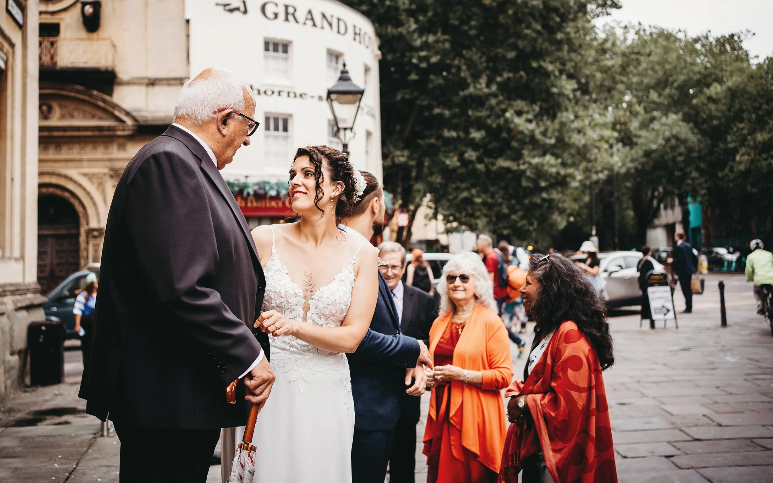 Bristol wedding photographer - image of a bride with her father after her wedding in Bristol.