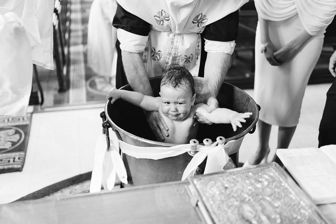 Bristol baptism photographer - image of a greek baptism in Bristol.
