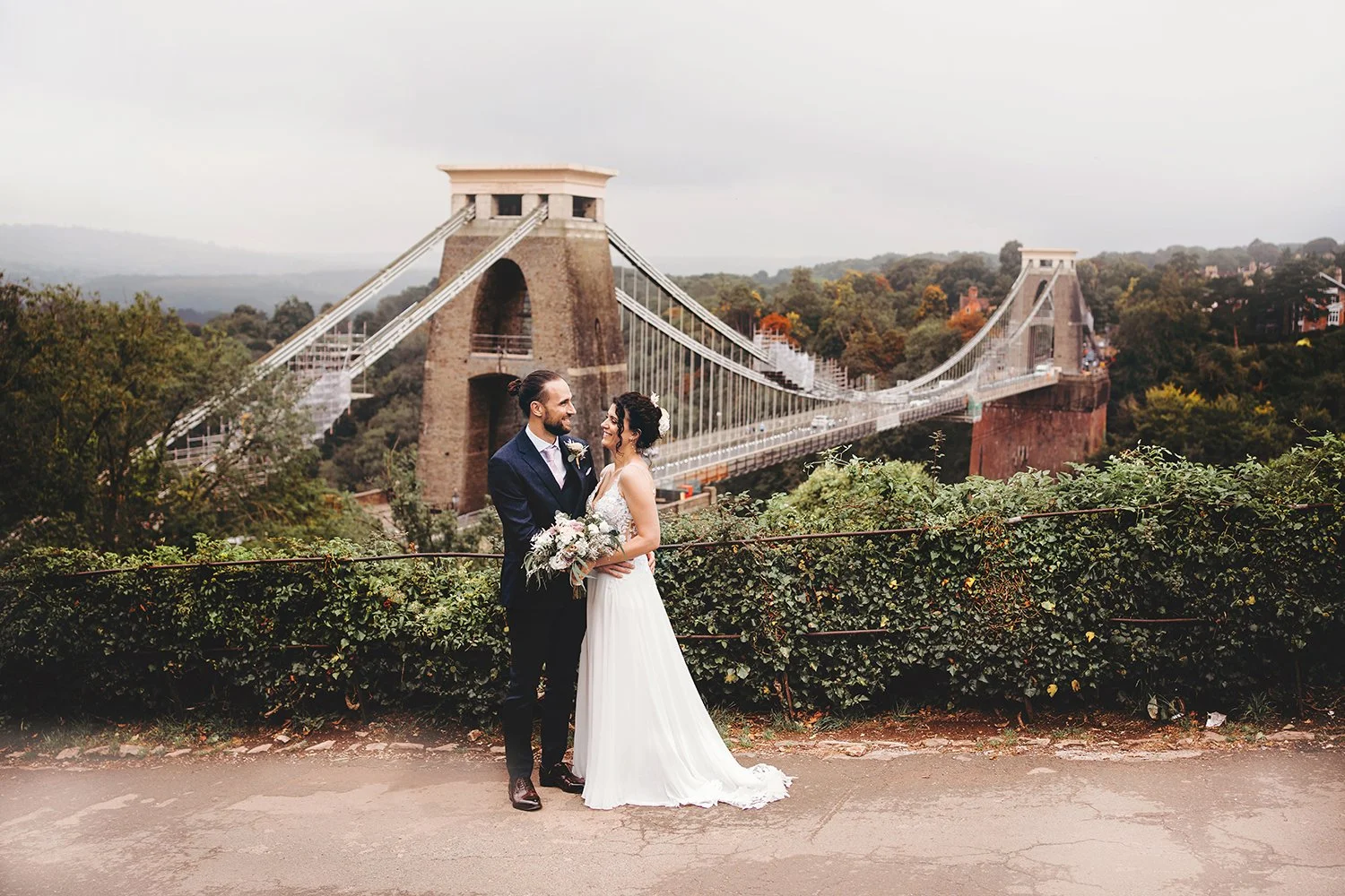 Bristol & Bath wedding photographer - image of wedding couple in front of Bristol suspension bridge.