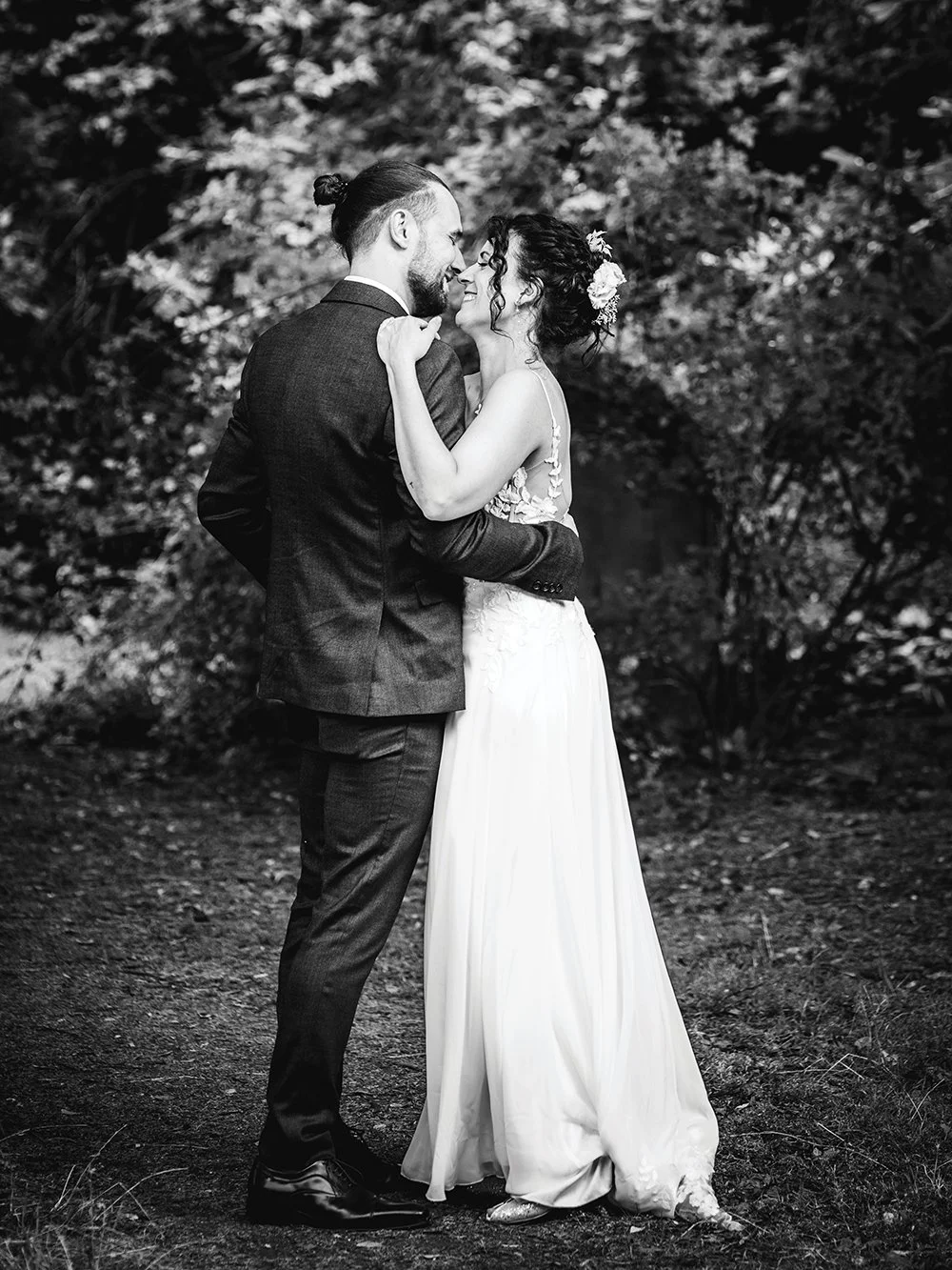 Bristol & Bath wedding photographer - image of wedding couple holding each other.