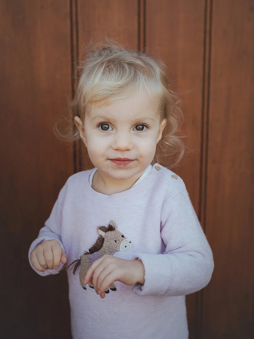 Image of older daughter during a family photoshoot.