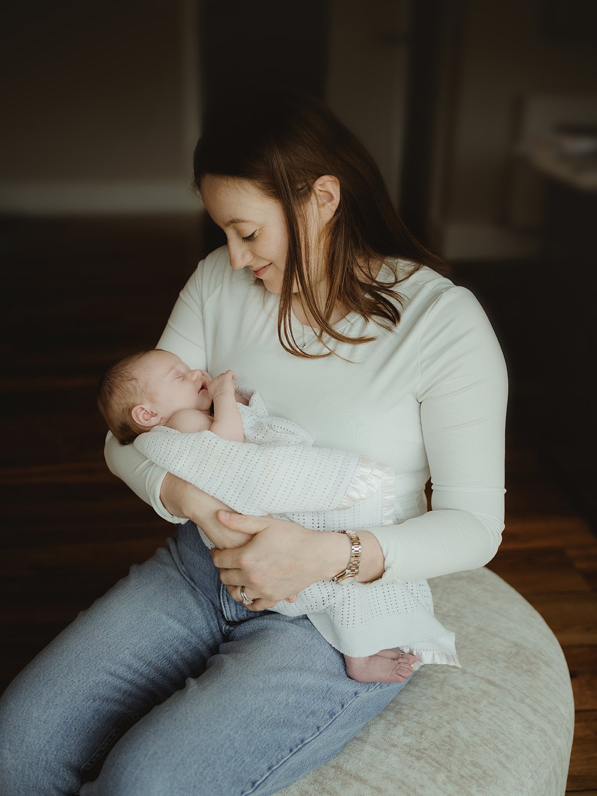 Portrait of mother holding her baby.