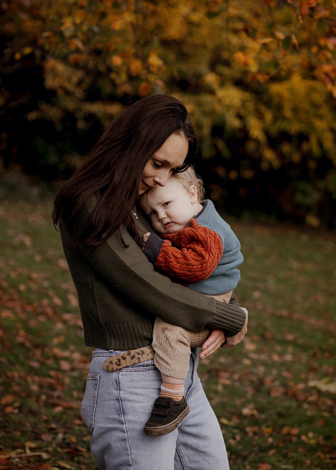 Mother holding her boy during an outdoor family photoshoot in Bristol.