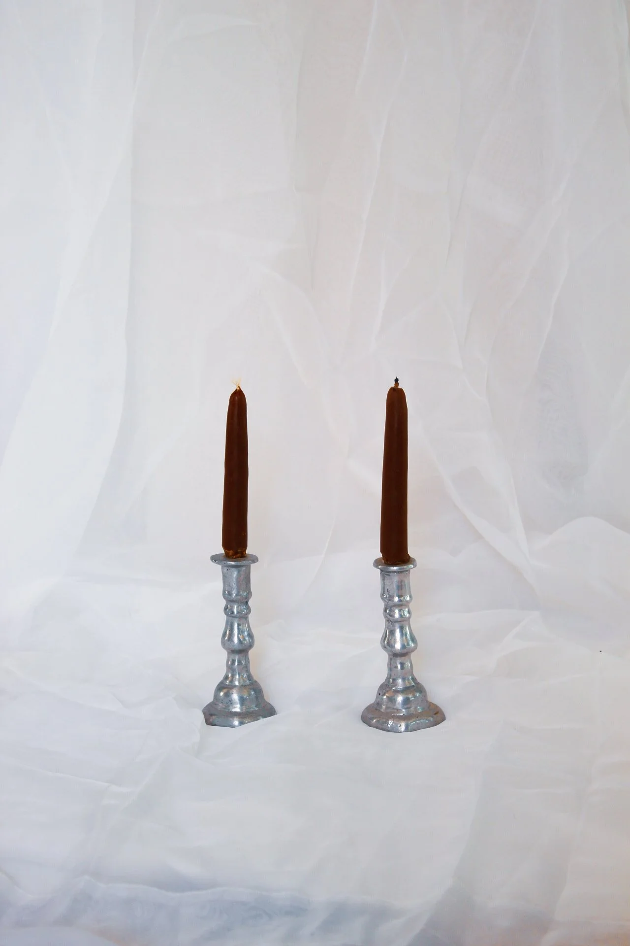 par de pequeños porta velas vintage