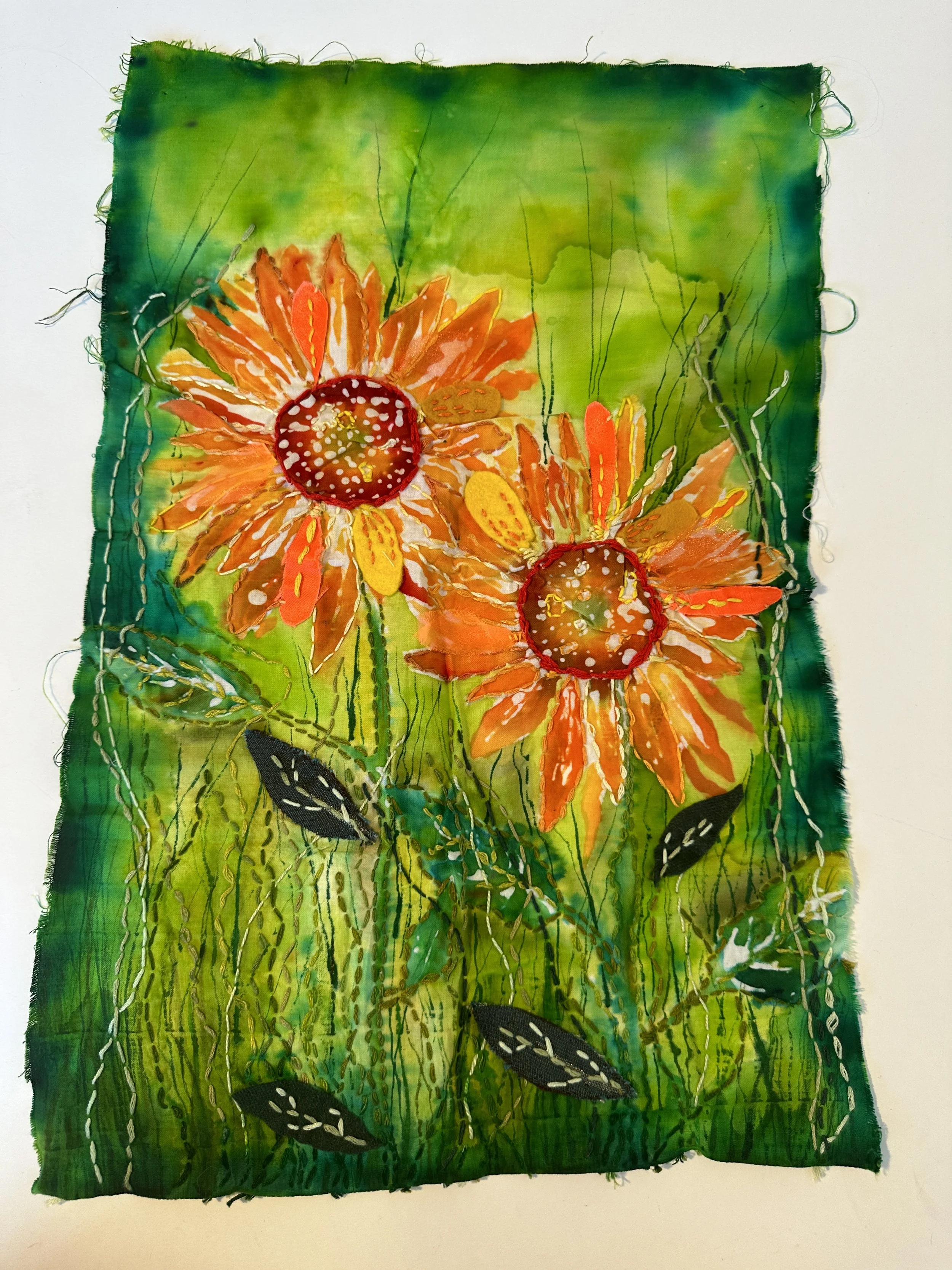 Batik sunflowers using appliqué, hand embroidery and paints 46cm L, 30 cm W