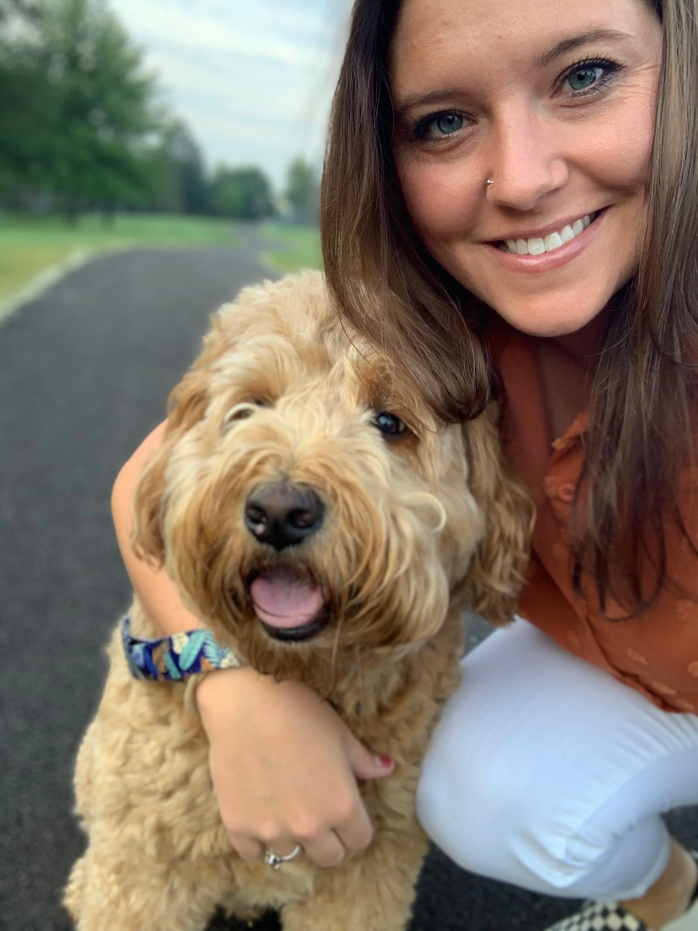 Amanda Huggins with her Goldendoodle Barkley at Mind Matters Oasis
