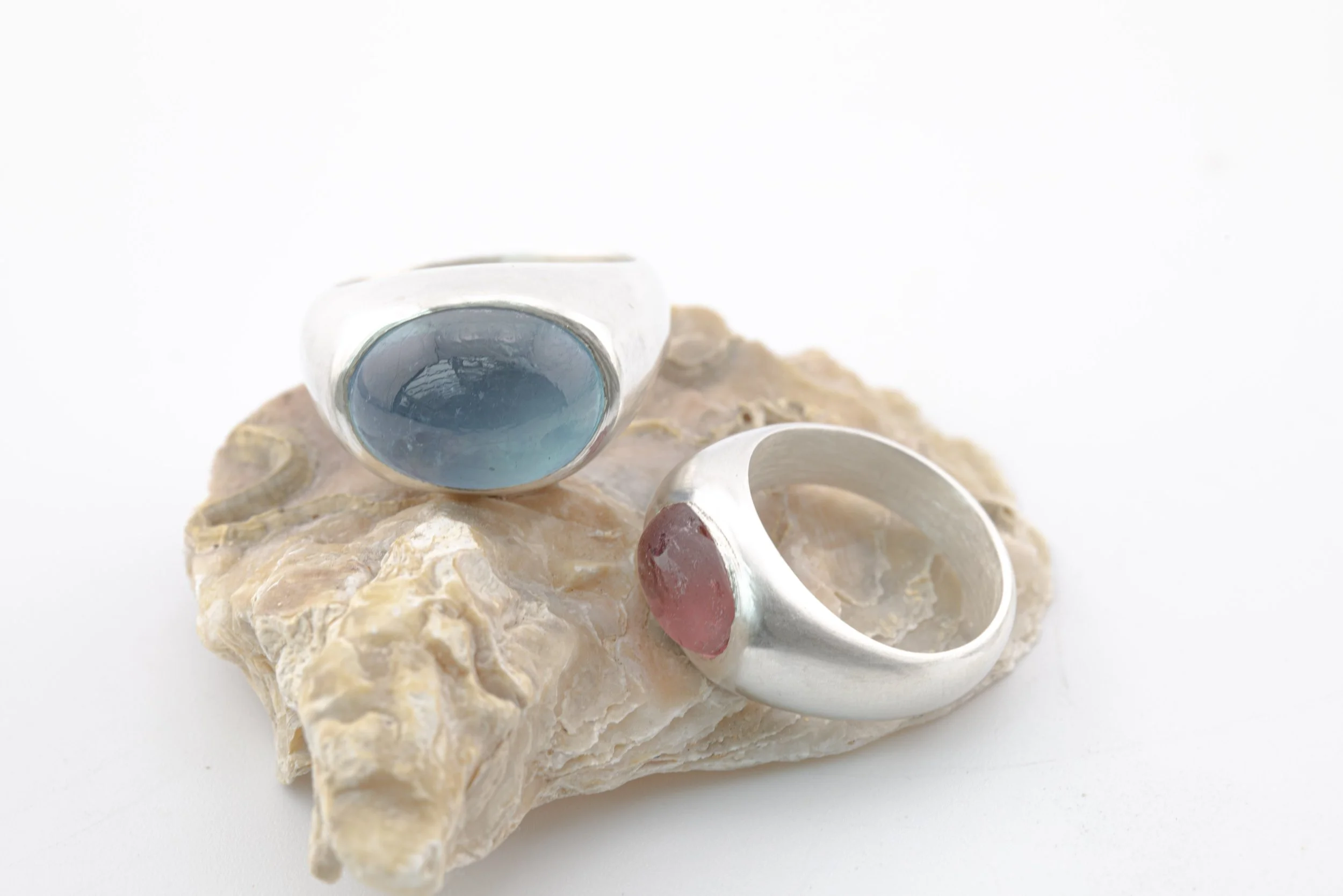 Lost wax carved Sterling Silver cast rings with aquamarine and pink tourmaline cabochons.jpg