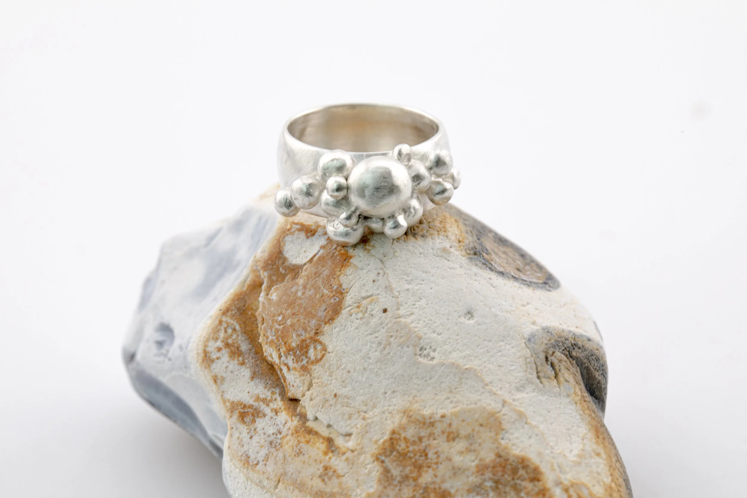 Wide slightly rounded Sterling silver band with granulation.jpg