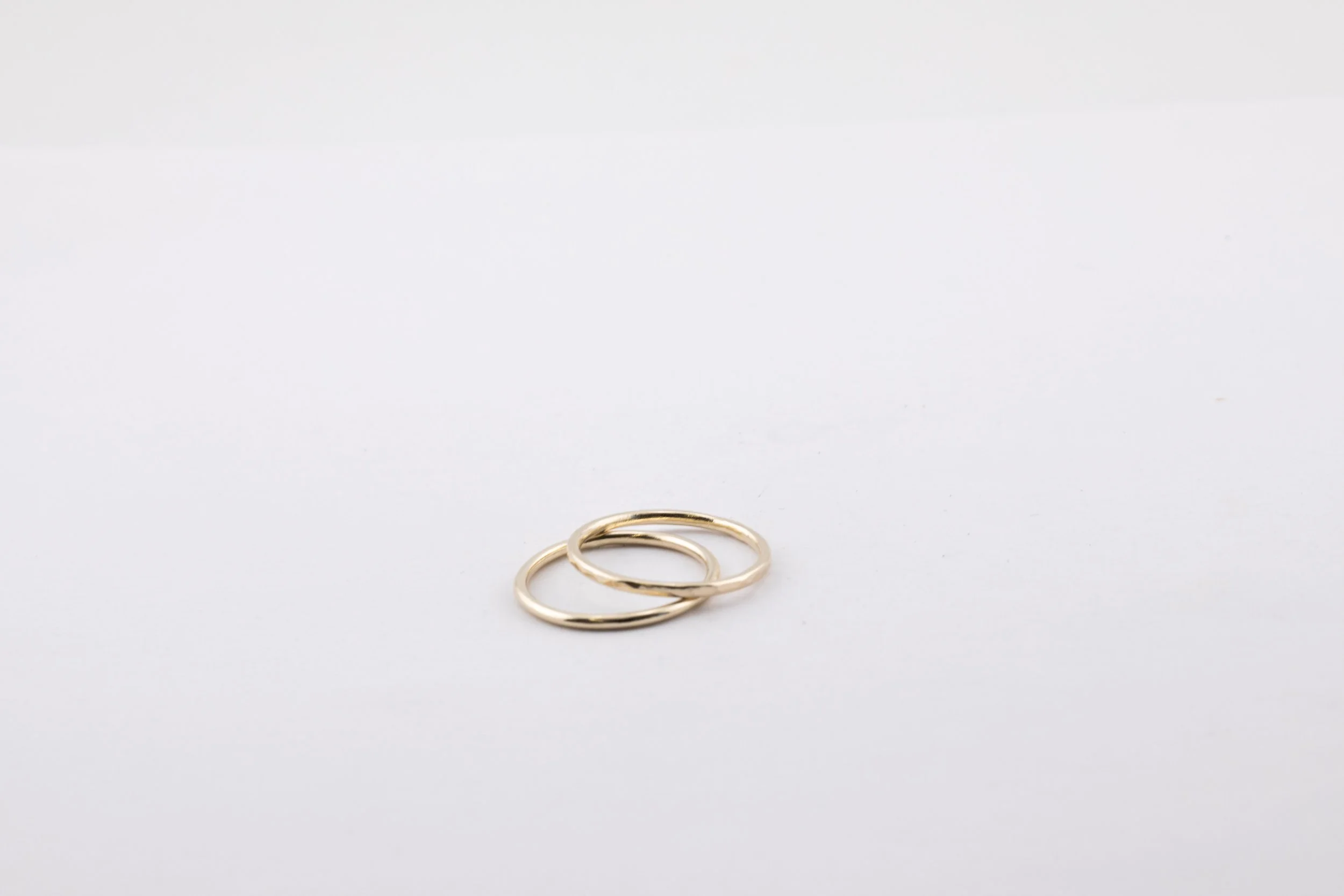 Gold wedding bands- round smooth and square hammered.jpg