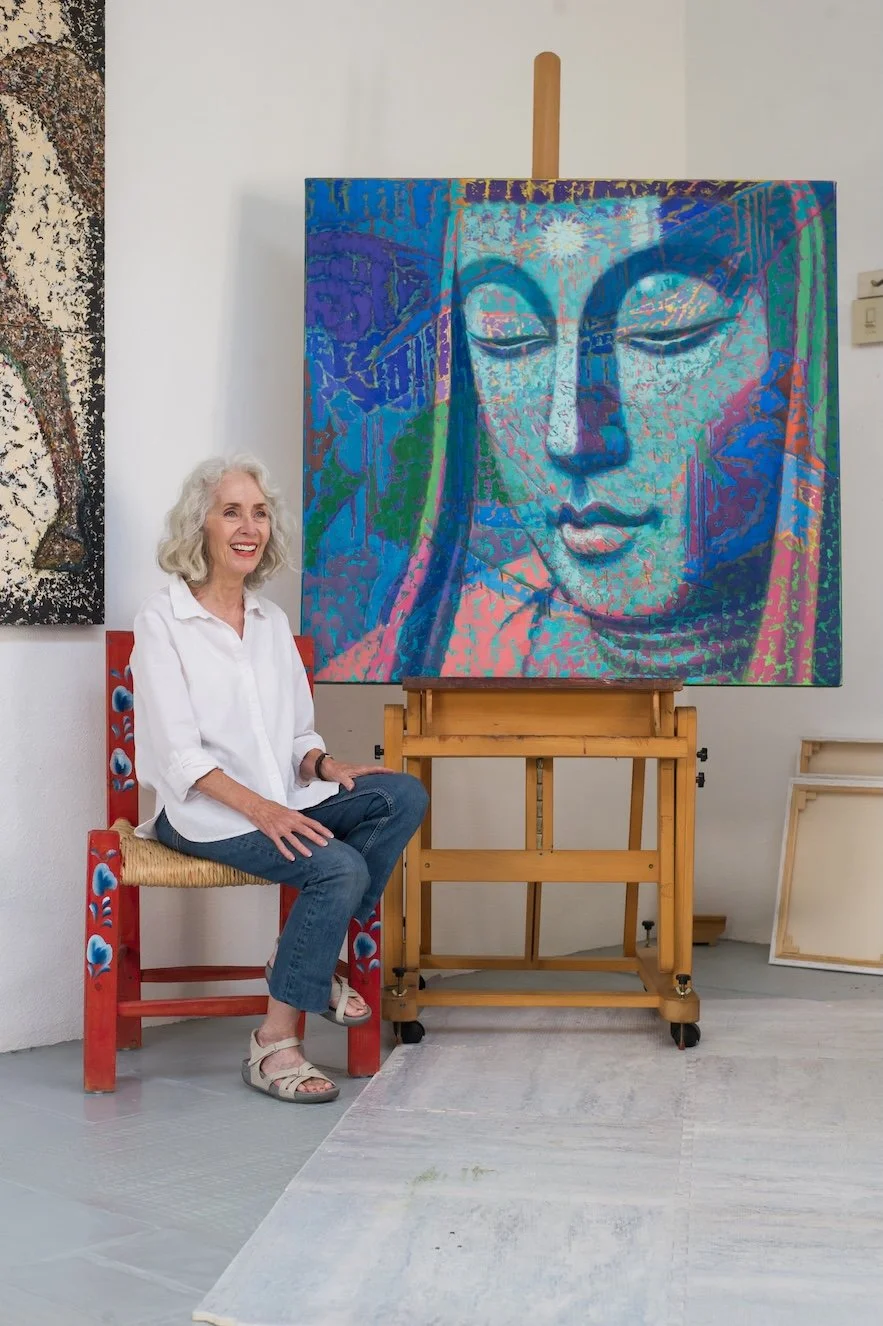 Virginia in her studio next to Goddess painting