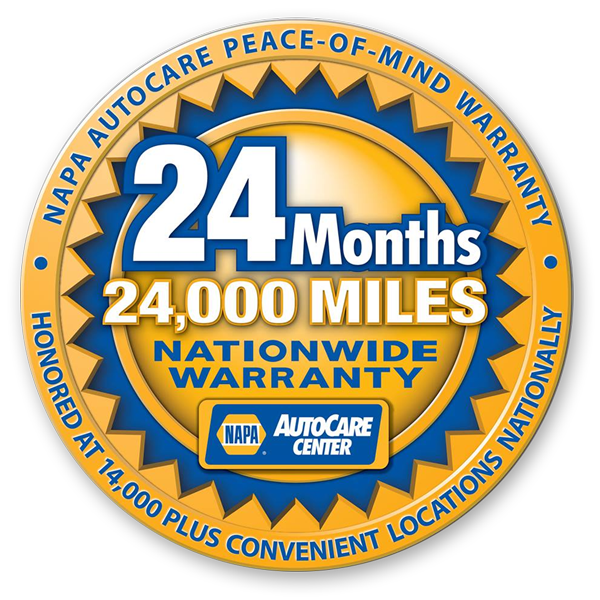 A circular badge with a gold border and blue accents showing a 24-month nationwide warranty for NAPA AutoCare. It states 24,000 miles coverage, honored at over 14,000 locations, and highlights the 24-month auto care peace-of-mind warranty.