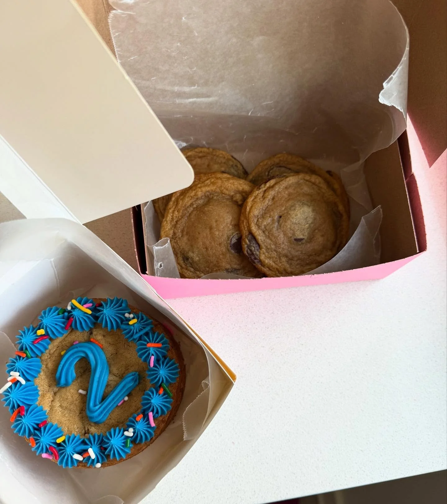 FLASH SALE! 🥳

To celebrate Maddog Cookies turning TWO tomorrow, snag this mini cookie cake and 4 classic chocolate chip cookies for $20! 🍪

Chocolate chip cookie cake with cream cheese frosting filling and vanilla buttercream on top + 4 classic ch