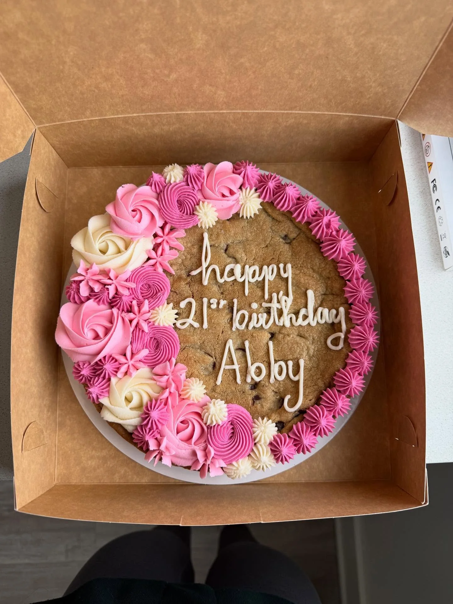 Celebrating with a cookie cake >>>>

Chocolate chip cookie with homemade vanilla buttercream! This customer sent photos of the design but requested white and shades of pink for her colors 💕 

Cookie cakes are available on my website!! Go
