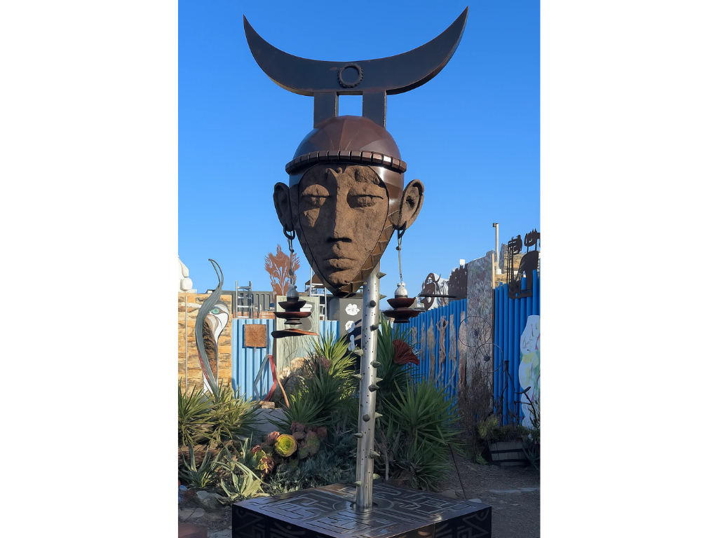 Whispers of Waste sculpture by Zulu Heru