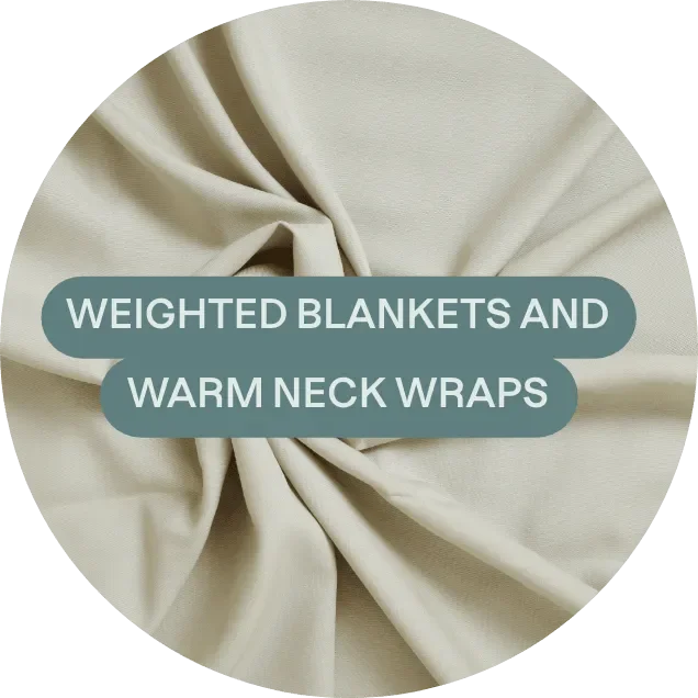 Display of a beige weighted blanket with a label that says 'Weighted Blankets and Warm Neck Wraps'.