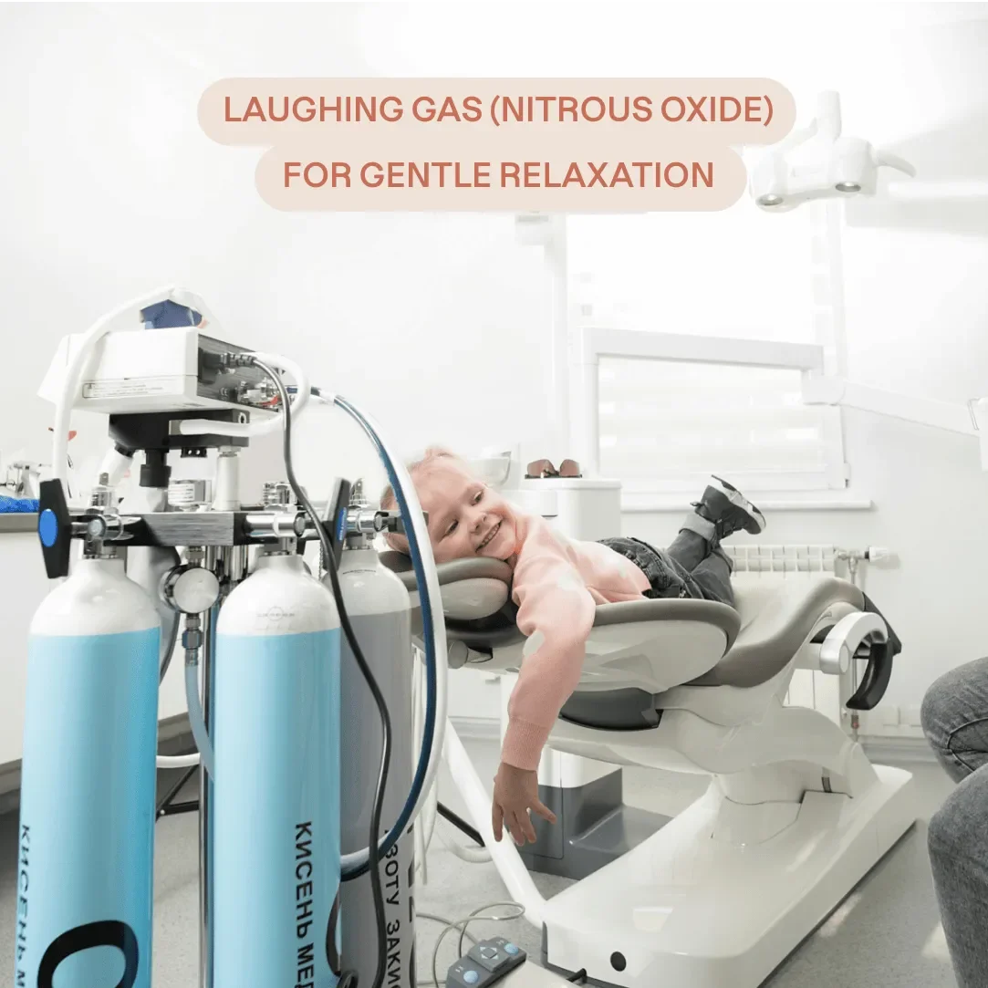 A young child lying on a dental chair in a dental office, smiling, with a gas mask used for laughing gas (nitrous oxide) near her face, with a caption stating 'Laughing Gas (Nitrous Oxide) for Gentle Relaxation'.