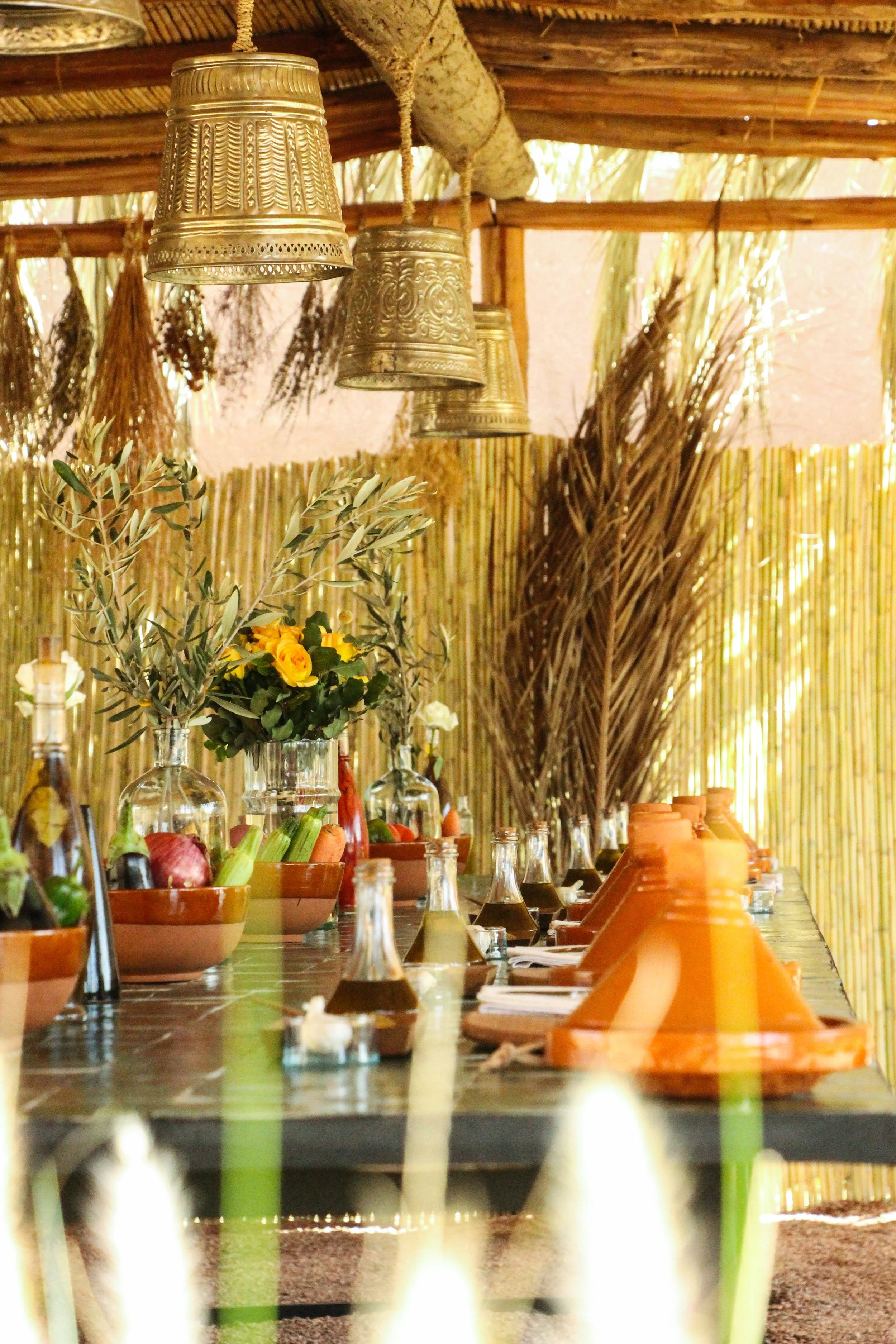 Long tiles tables used for hands-on Moroccan cooking class in Marrakech