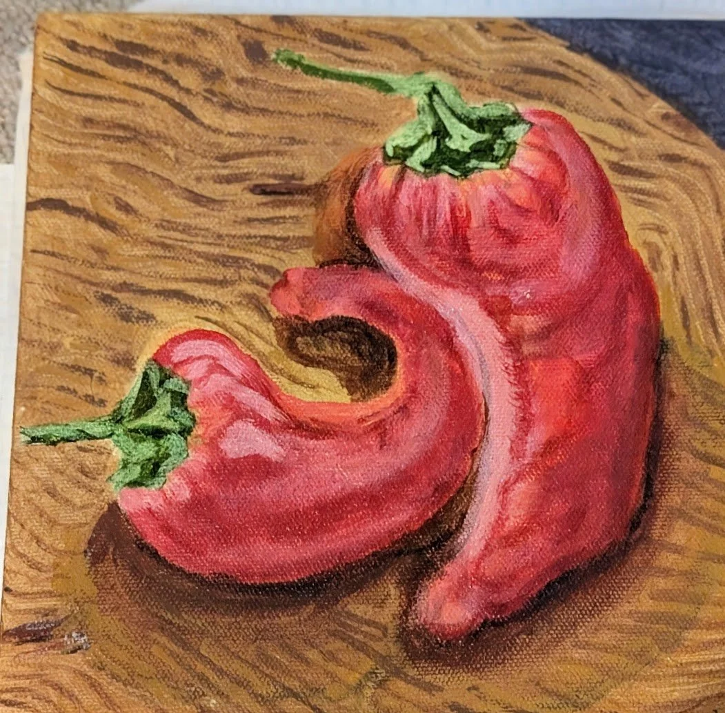 Sweet Peppers - Acrylic on Canvas 8 x 8 x 1.5 inches
A bold and vibrant depiction of fresh red peppers, this small canvas brings a splash of color and energy to any kitchen or dining space. The rich reds and earthy tones capture both flavour and warm