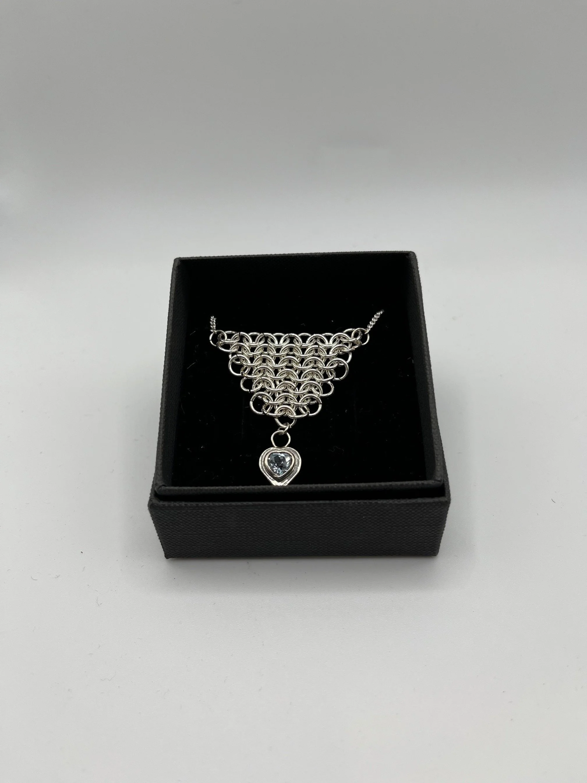 Silver chainmail and heart necklace