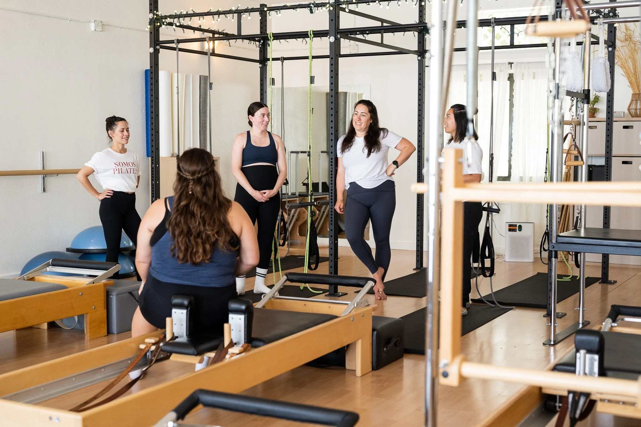 Somos Pilates members spending time together after class.