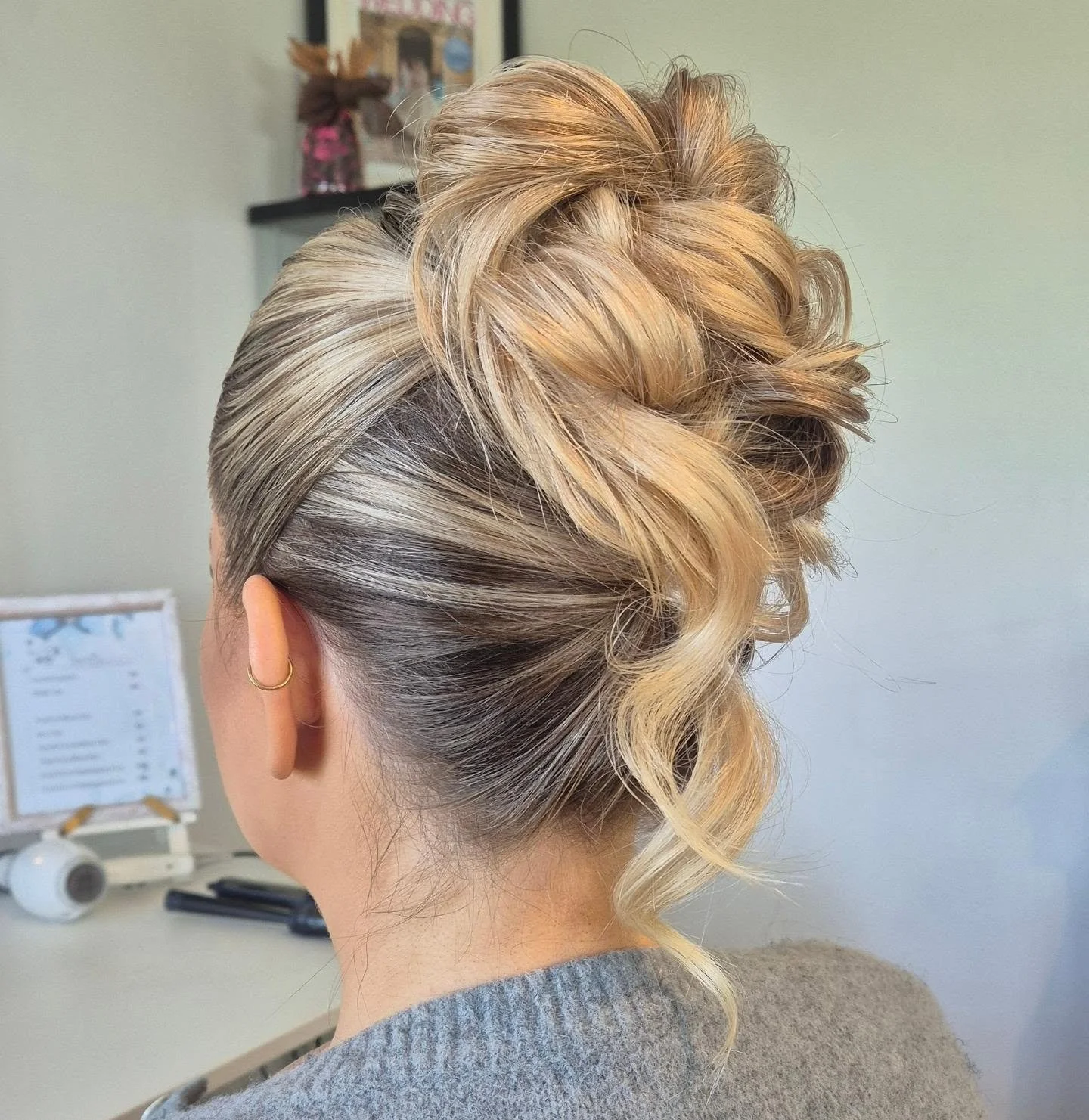 Sleek modern updo, 
Ideal for wedding guests &amp; windy days!