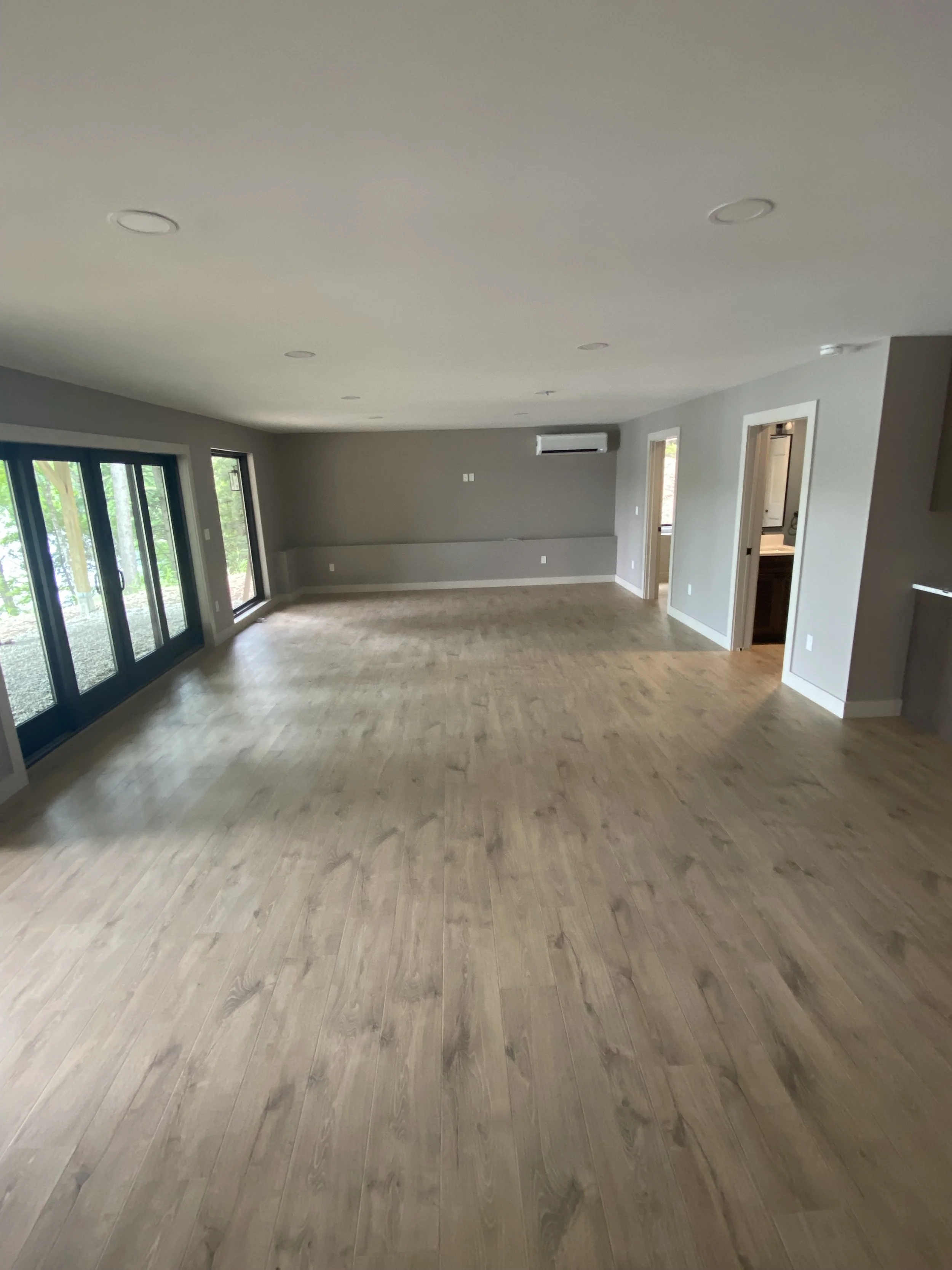 Clean finished interior paint project - open space den area
