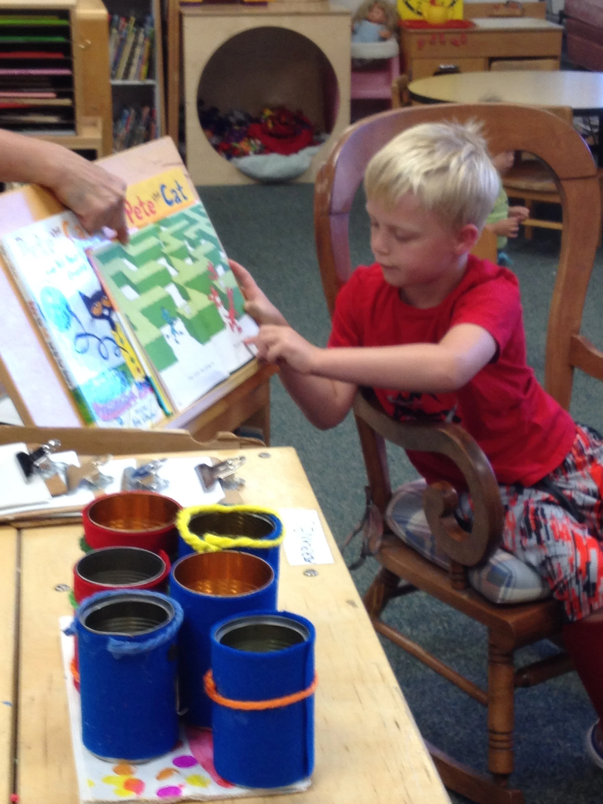 EARLY LITERACY: We create a rich language environment where children are exposed to books, songs, rhymes, and conversations throughout the day. We focus on building foundational skills such as letter recognition, phonemic awareness, and early writing