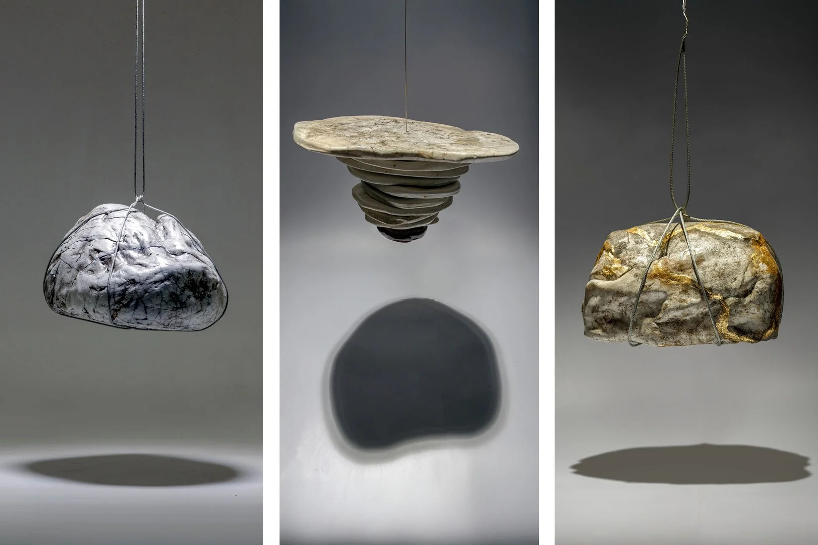 Installations consisting of individual suspended pieces. Dimensions: 30 cm x 25 cm x 15 cm | 15 cm x 15 cm (whole stack) | 35 cm x 25 cm x 25 cm. Materials: handmade ceramic, PVC, steel wire. Technique: Raku | Low fire glazing | Raku and Kintsugi. 20