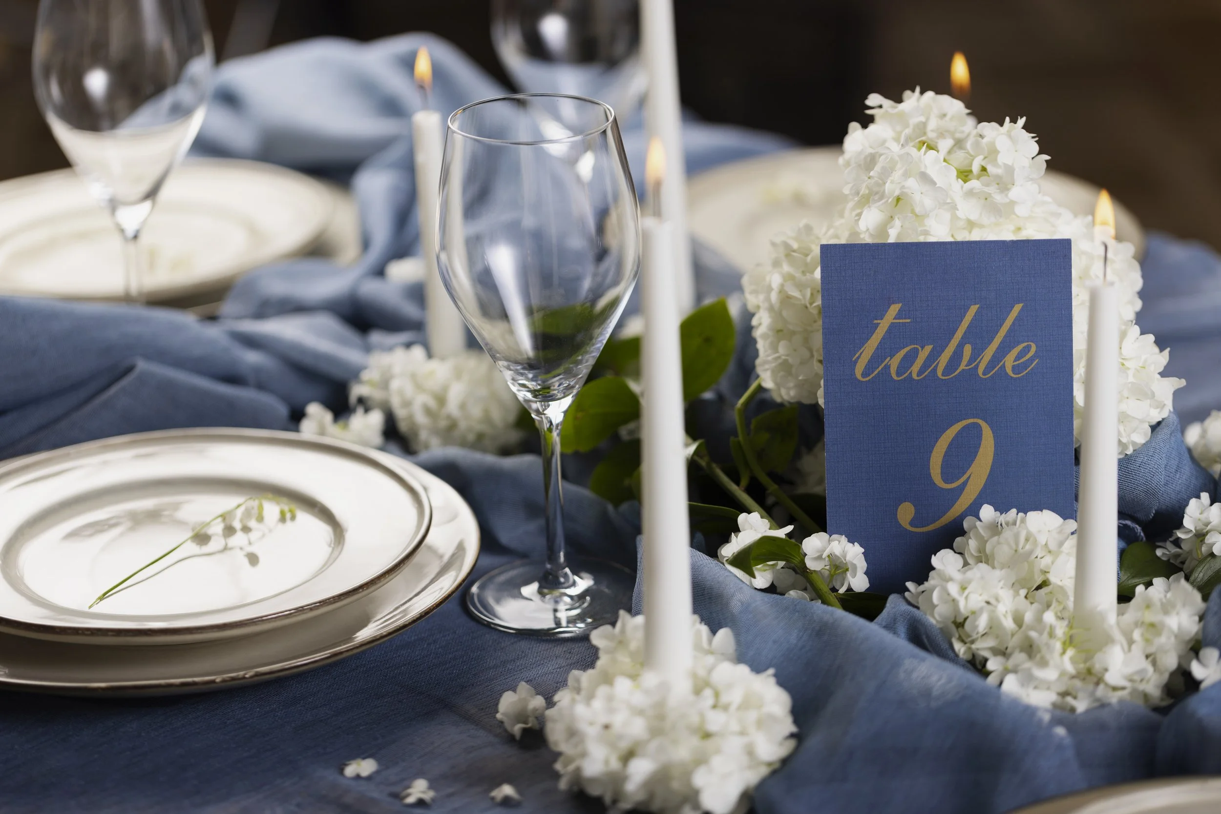 high-angle-wedding-table-number-with-cloth.jpg