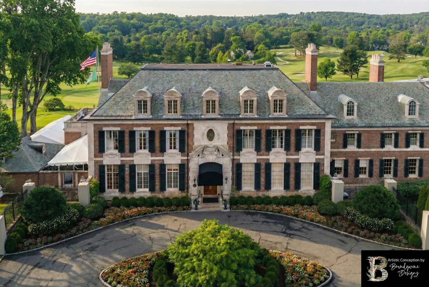 Large estate home with formal front landscaping and circular driveway in Malvern, PA