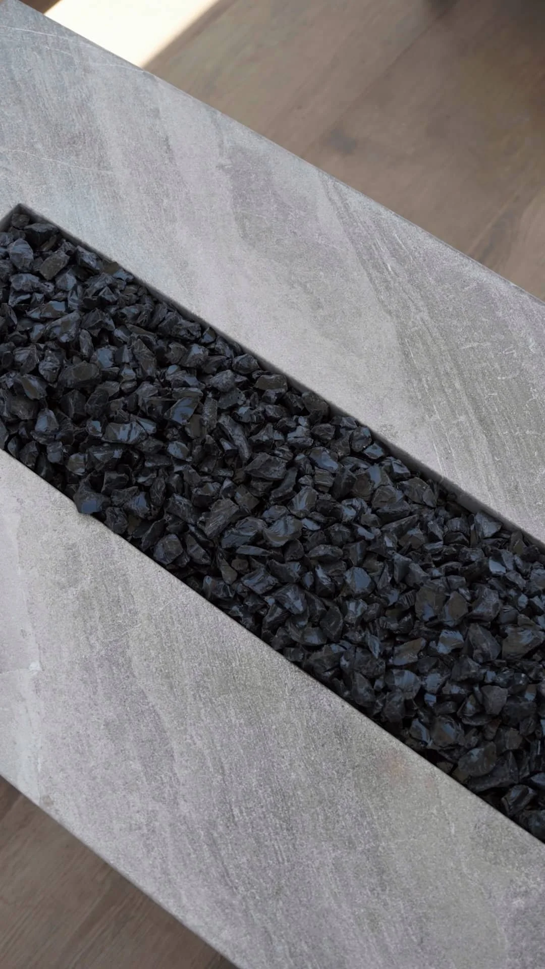 A gravel and stone accent detail in Scottsdale, AZ used to enhance plantings in a landscape design
