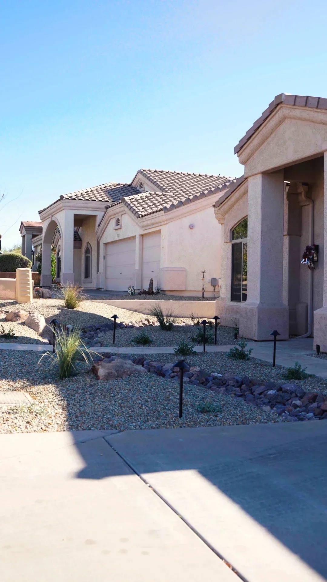 outdoor lighting fixtures illuminating a pergola and dining area in Avondale, AZ