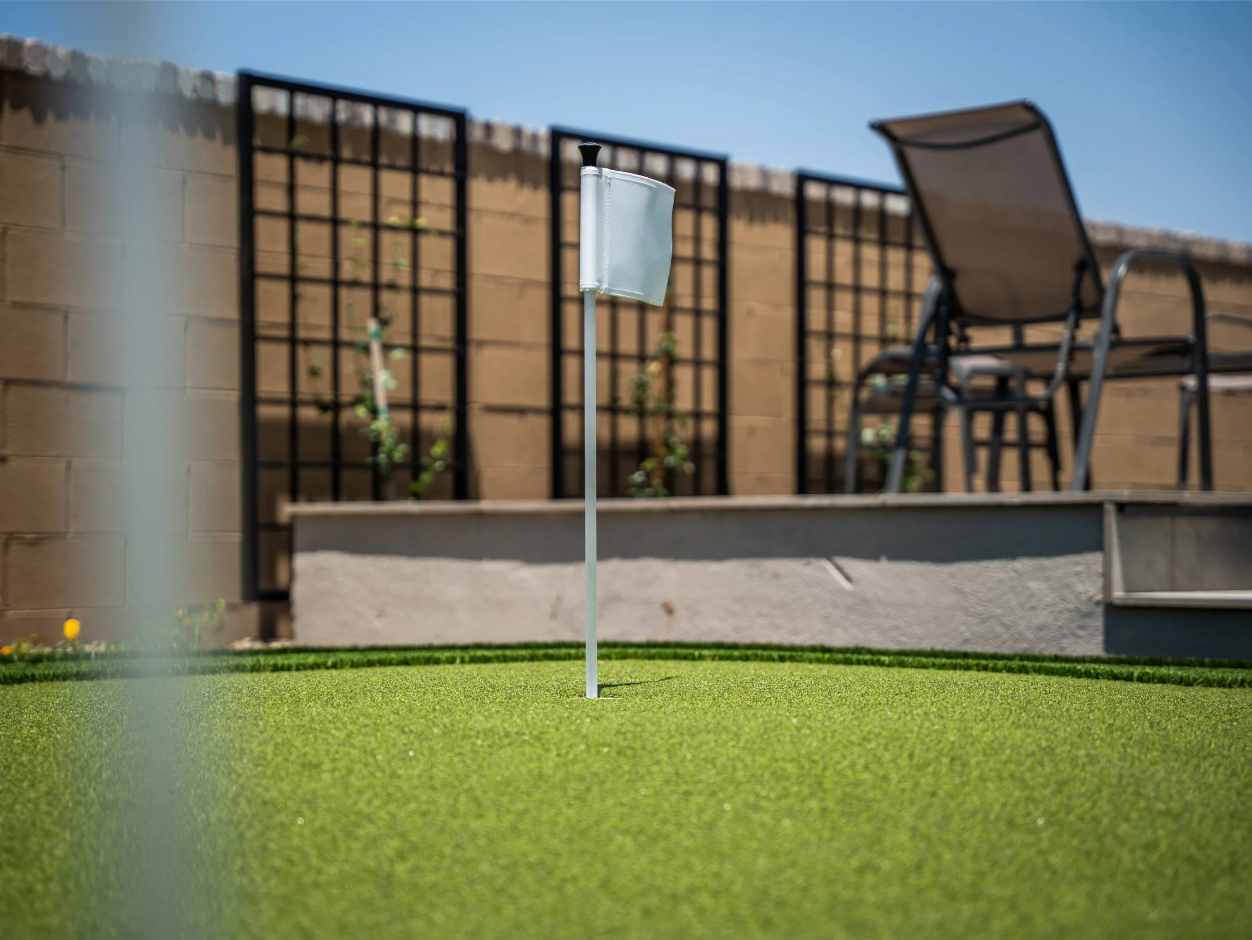 Putting green flag and artificial turf surface in Queen Creek, AZ