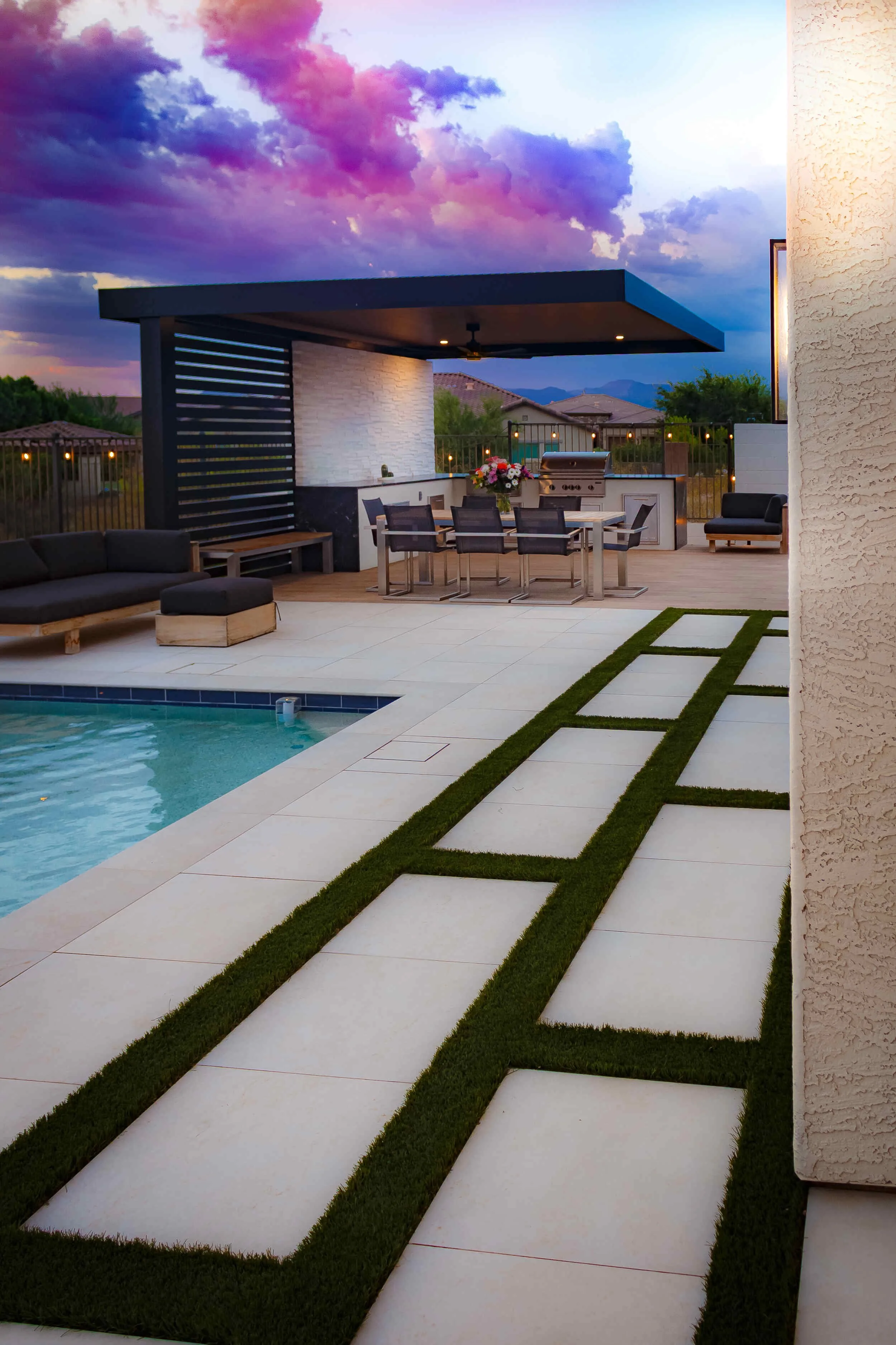 Backyard pergola seating with landscape design and plantings in Queen Creek, AZ