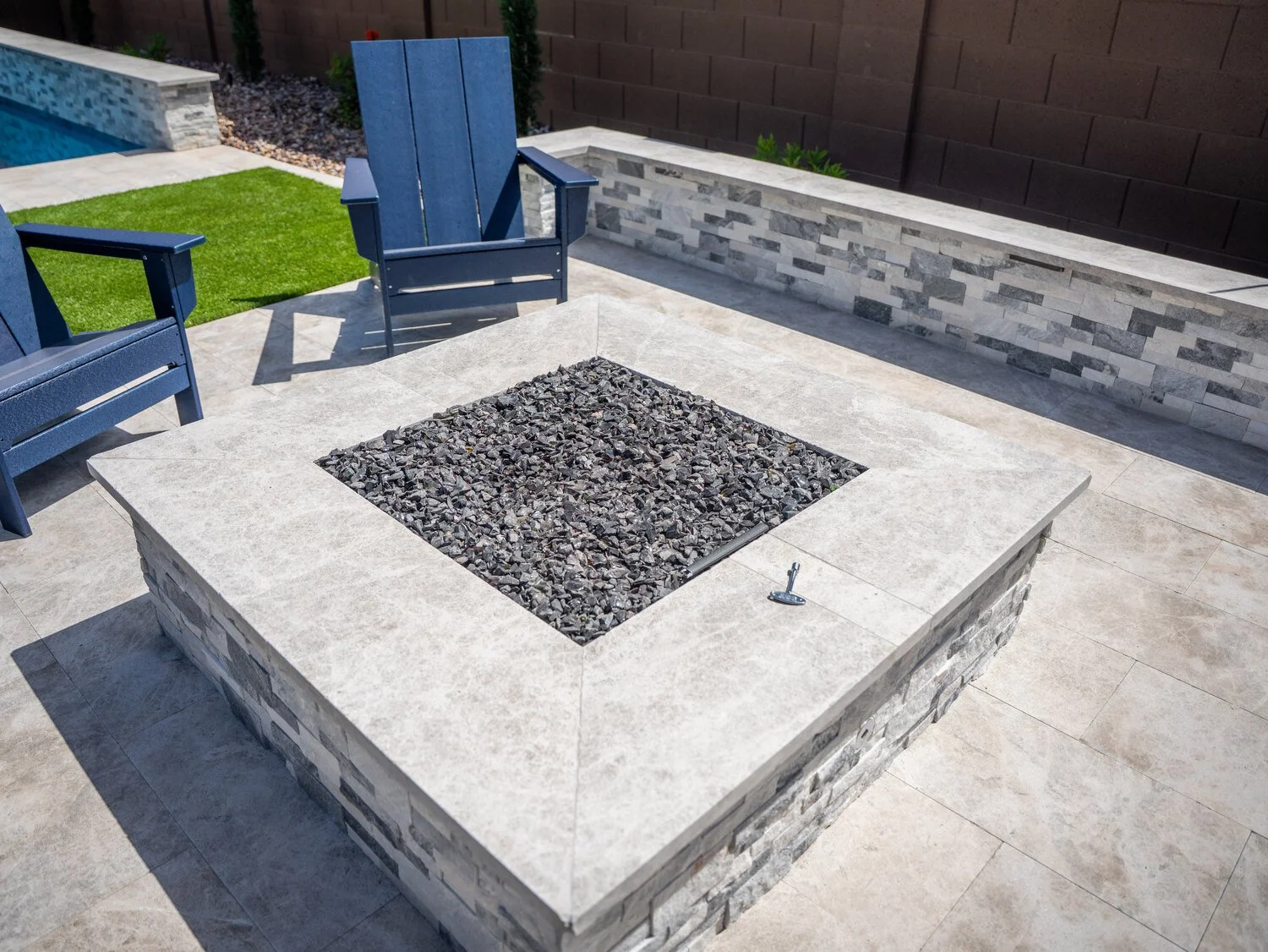 Clean rectangular fire pits set into a modern patio layout in Arcadia, AZ