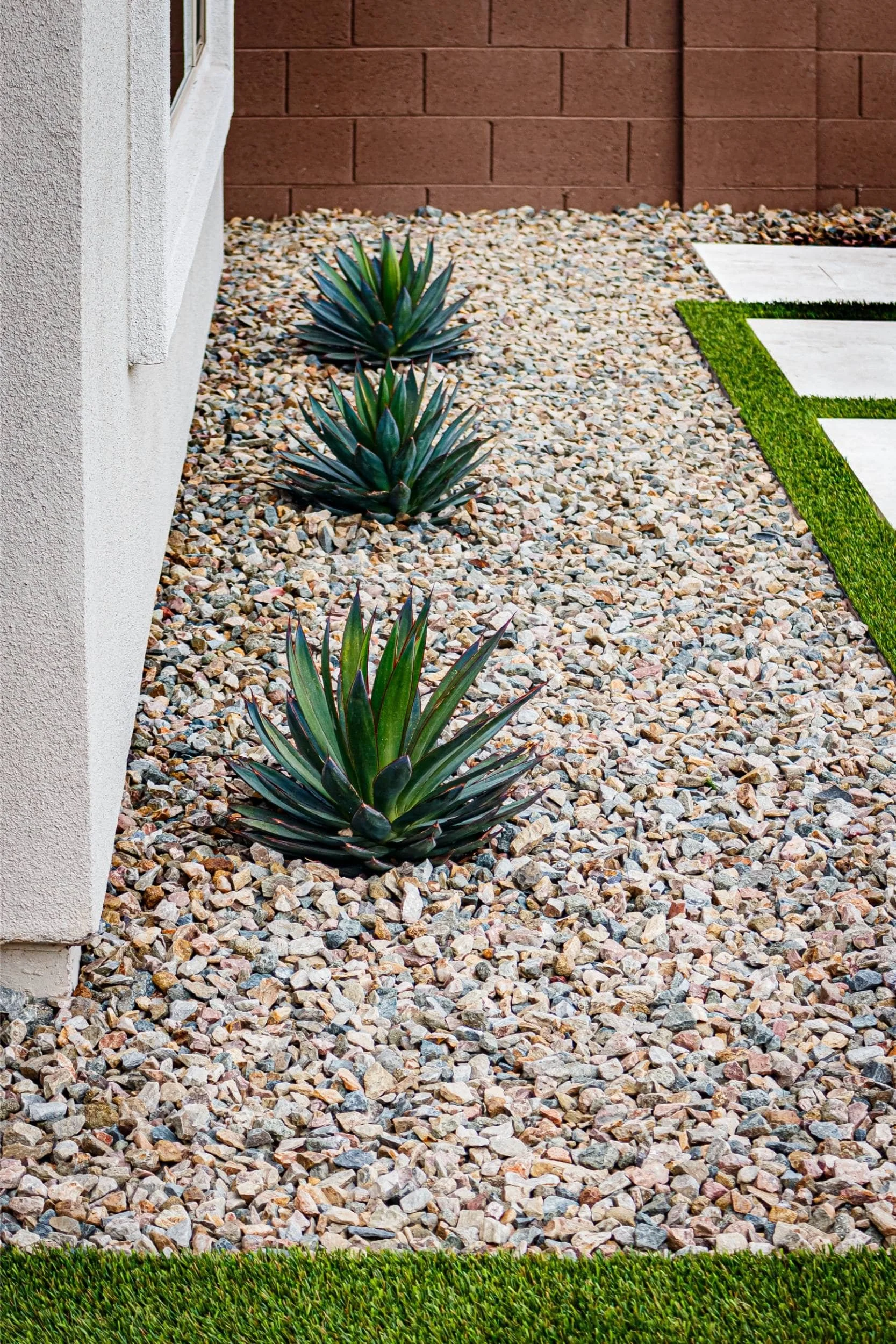 A planter box arrangement in Paradise Valley, AZ with desert plantings and gravel accents