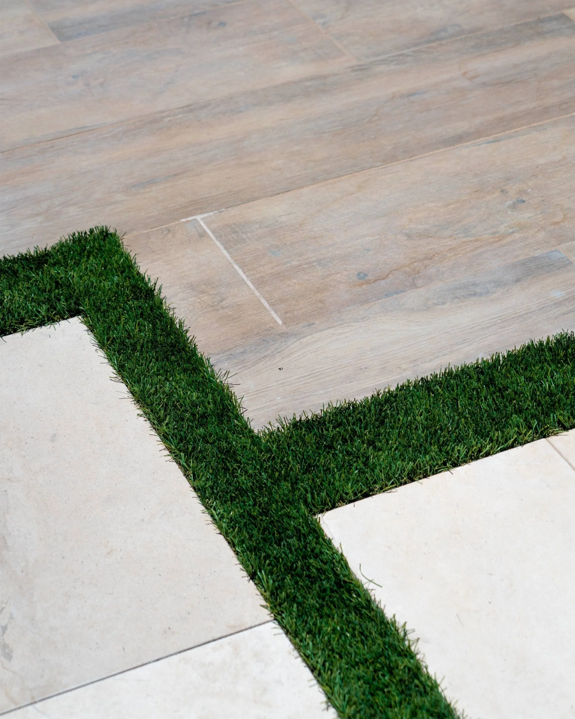Concrete pavers set in artificial turf in Paradise Valley, AZ highlighting minimalist landscape design