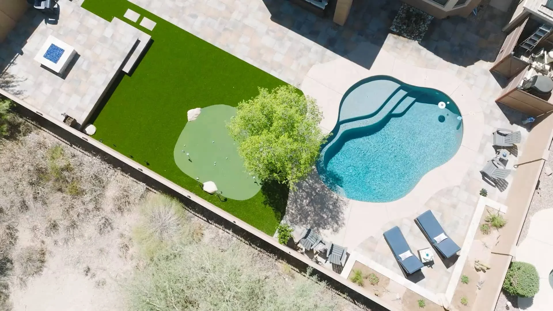 A bird’s-eye view of a backyard layout in Paradise Valley, AZ showing landscape design around a pool.