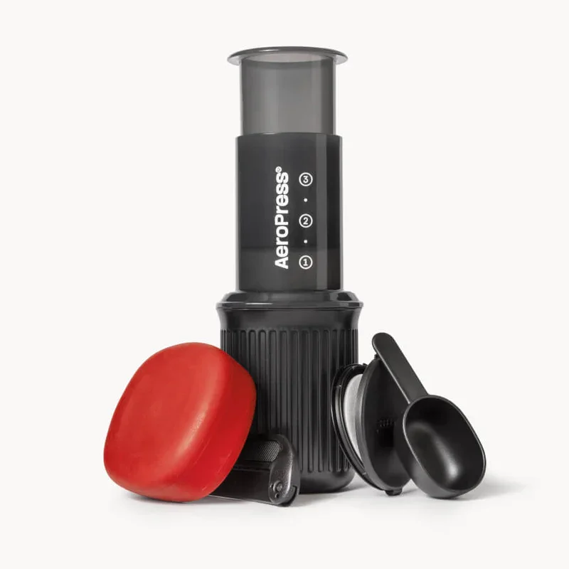AeroPress Go travel coffee maker brewing on a travel mug