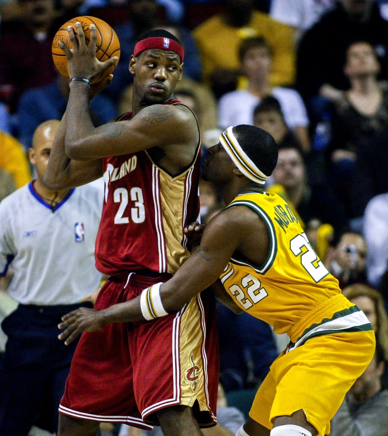 Cleveland Cavalier rookie LeBron James looks to pass the ball during a game against the Sonics at Key Arena.