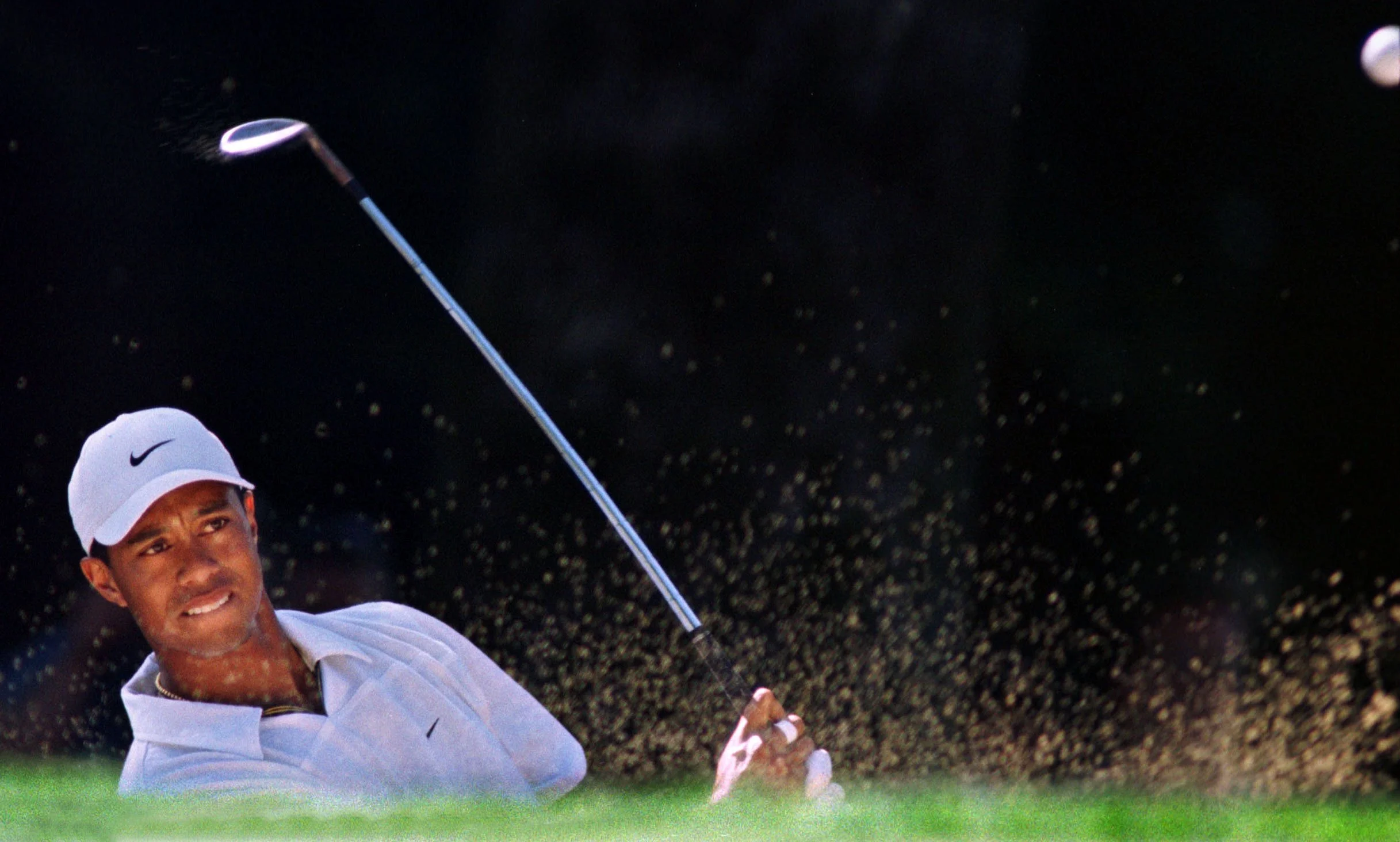 Tiger Woods hits out of the sand during the 1998 PGA Championship at Sahalee.