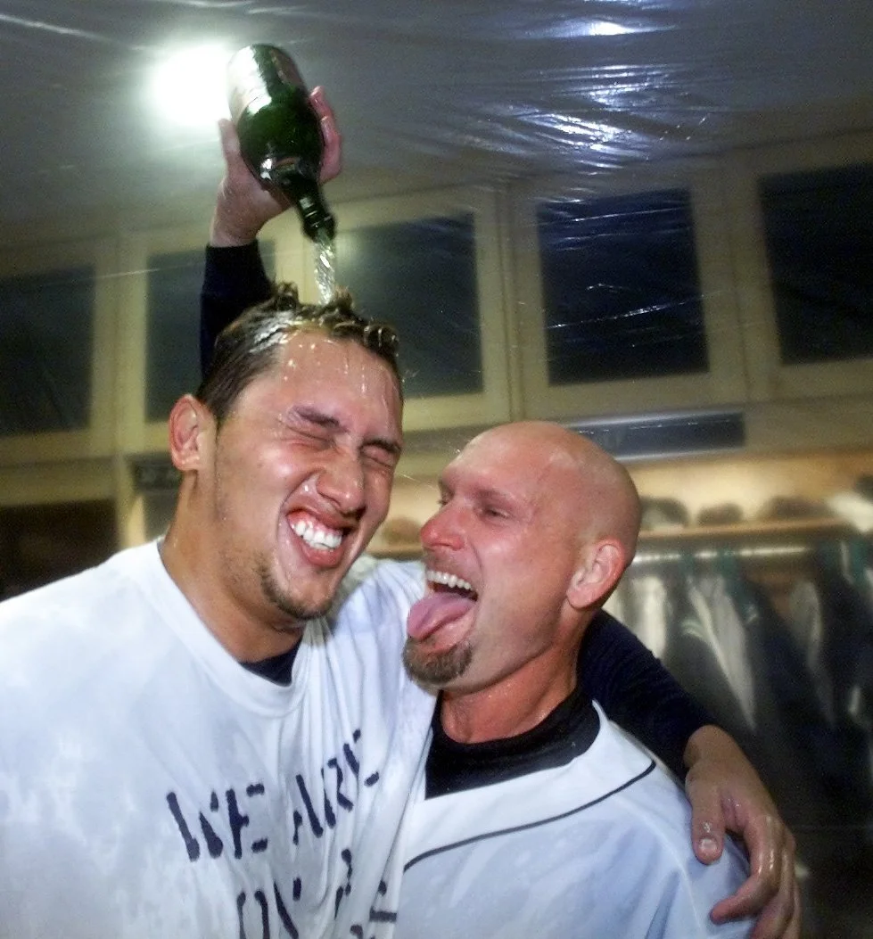 Mariners Freddy Garcia and Jay Buhner celebrate in the clubhouse after sweeping the Chicago Whitesox in the American League Division Series.