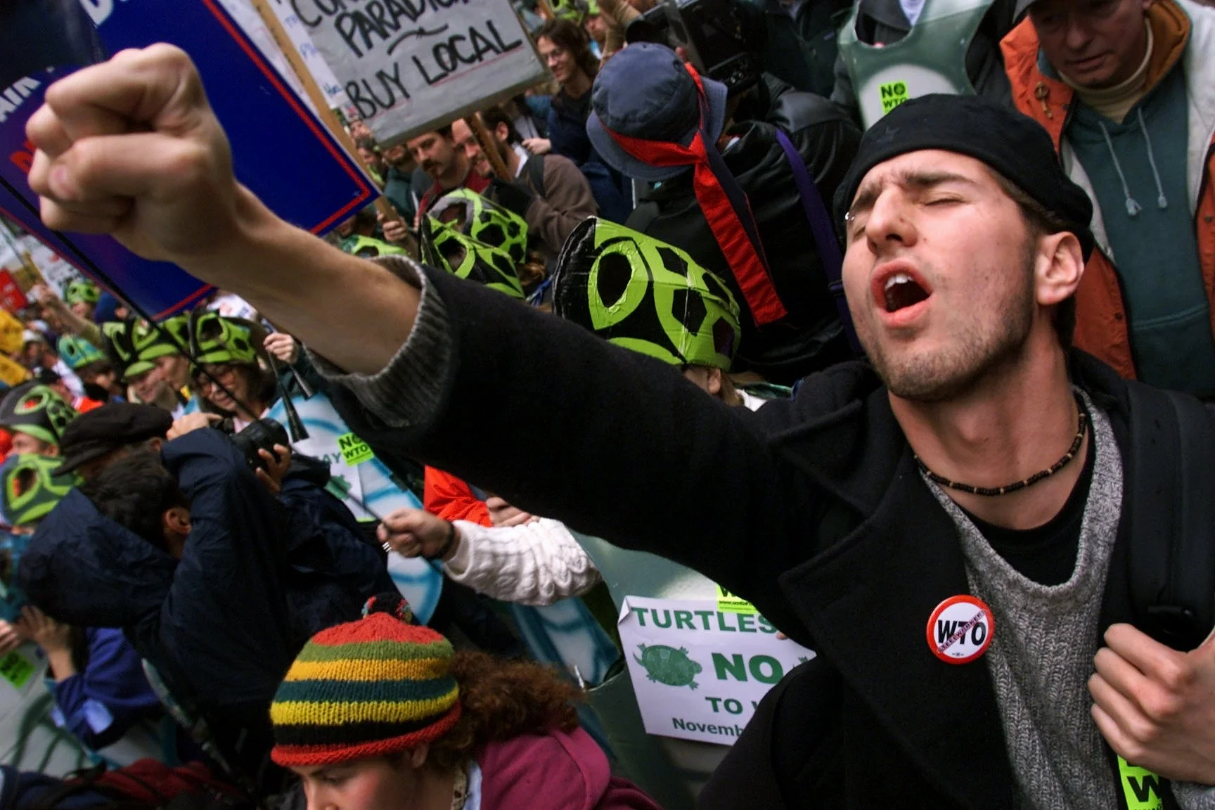 Tadzio Mueller chants against free trade during the Seattle WTO protests in 1999. This was the calm before the storm, leading to several day of riots in downtown Seattle.