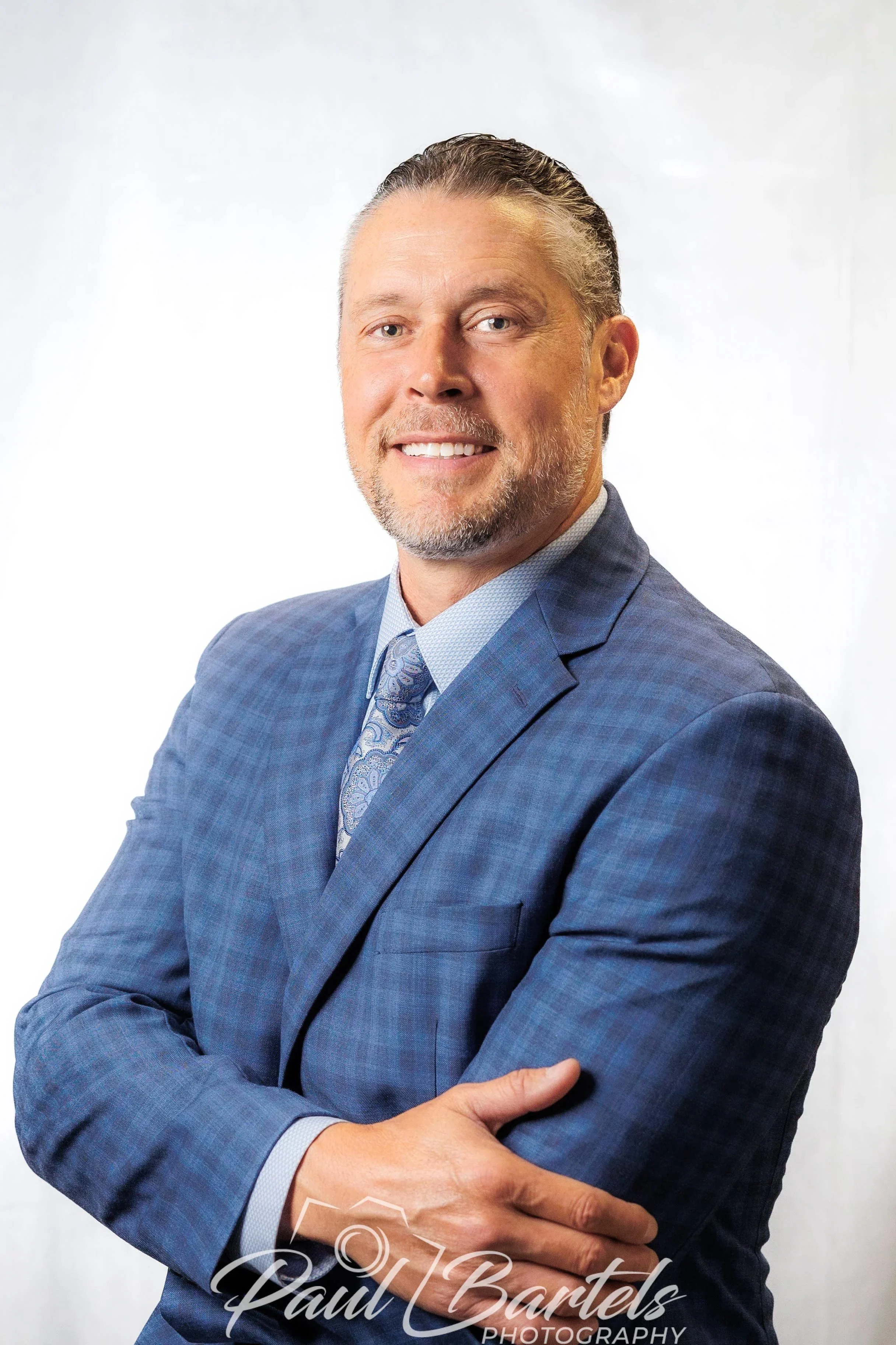 Headshot in Temecula with man in a blue suit