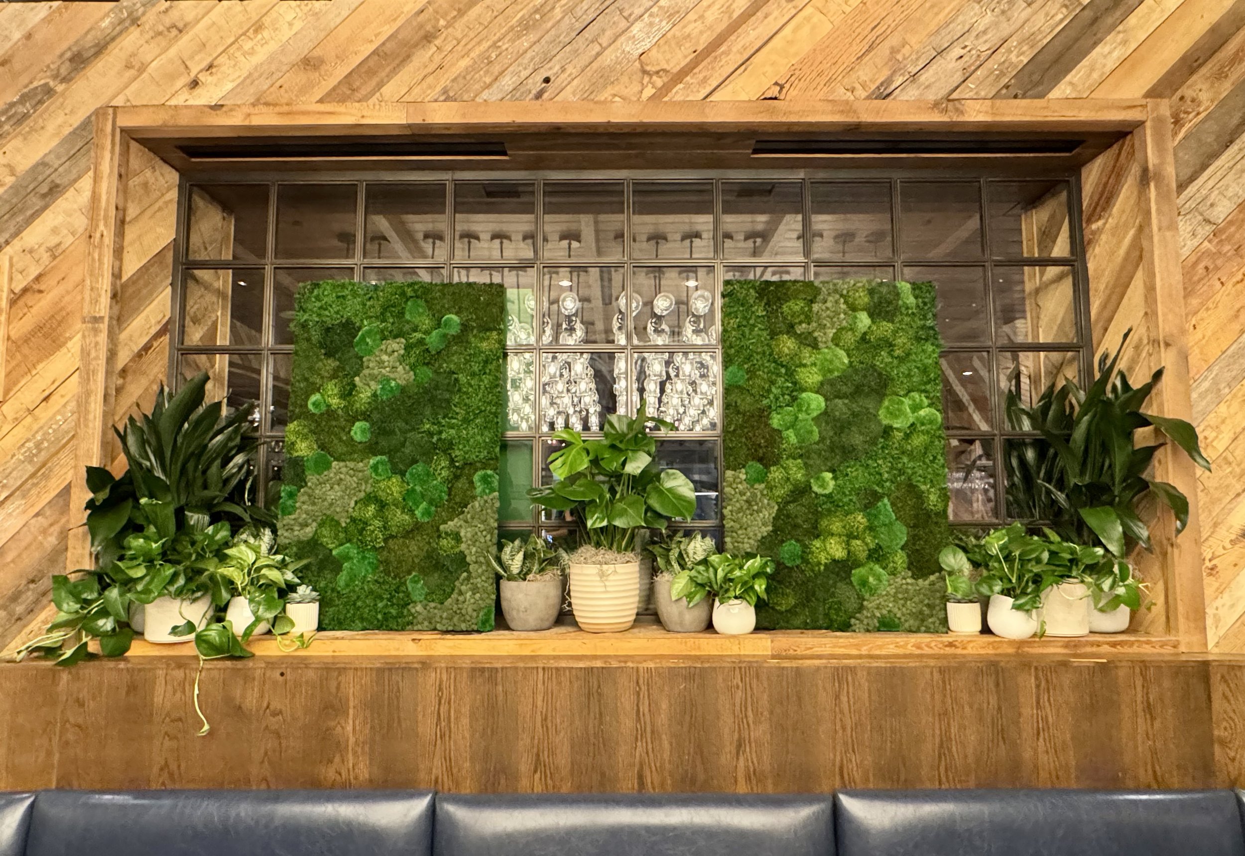 Event space in Las Vegas with rental moss wall panels and live plants