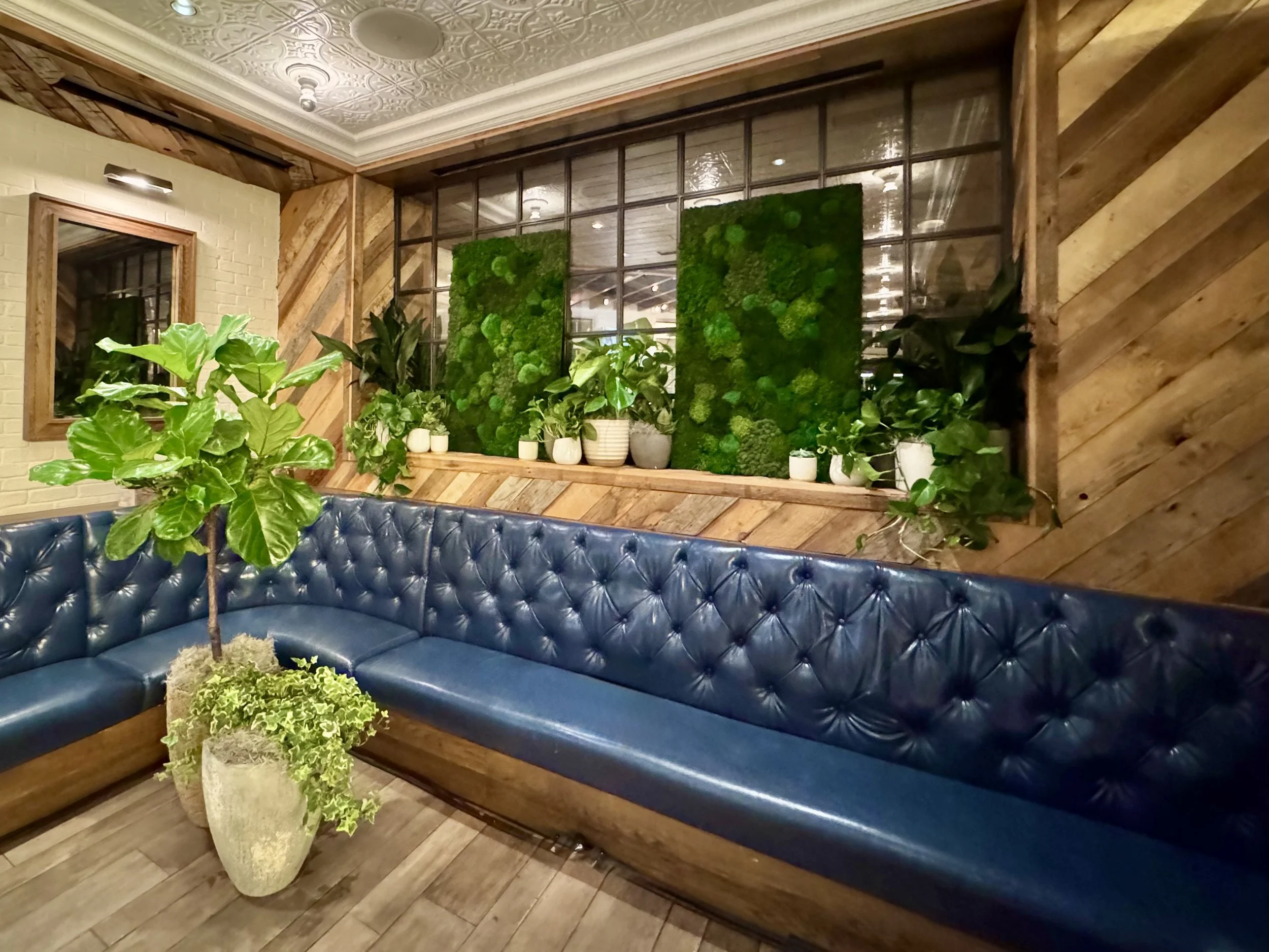Event space in Las Vegas with rental moss wall panels and live plants