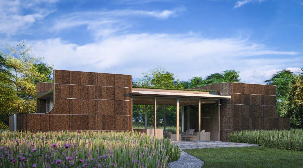 Modern house with a flat roof, large glass windows, surrounded by greenery and flowers, under a blue sky with some clouds. Bates Masi Architects.