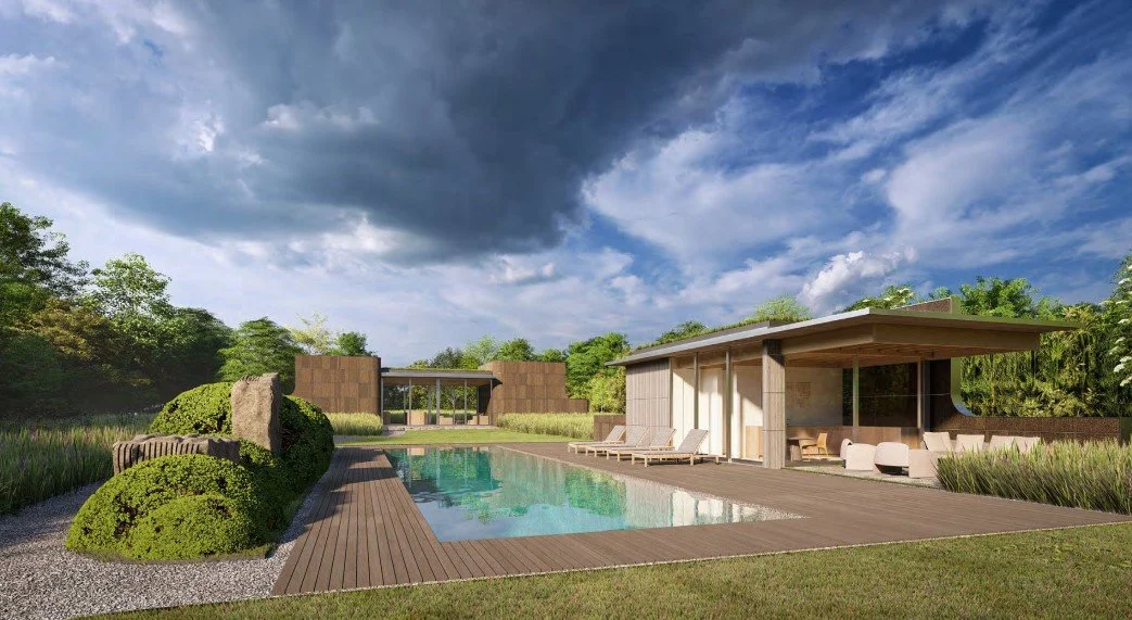 Modern house with outdoor pool, wooden deck, lounge chairs, and lush greenery under a cloudy sky. Bates Masi Architects construction in the Hamptons.