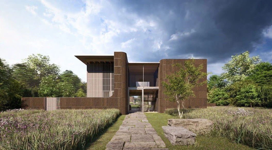 Modern two-story house with a stone pathway leading to the entrance, surrounded by lush green grass, trees, and wildflowers. Bates Masi Architects. 