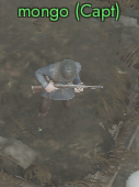 A person in camouflage clothing crouched by water, holding a rifle, with the label 'mongo (Capt)' in green text.